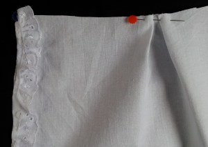 Apron front adding pleats and lace