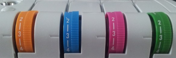 Overlocker tensio dials and foot pressue
