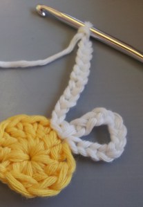 slip stitch into same chain space, chain 12