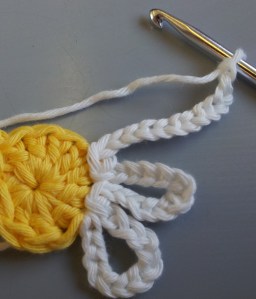 Slip stitch into space to form 2nd petal slip stitch chain 12