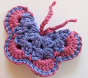 Slip stitching on Lilac and Pink Crochet Butterfly
