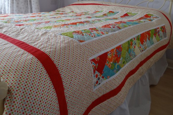 Friendship Braid quilt on bed