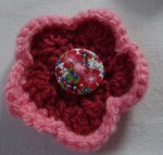 pink flower with button