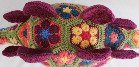 Puff the magic stegosaurus with his back plates Heidi Bear