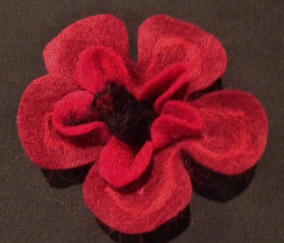 finished flat needle felted flower