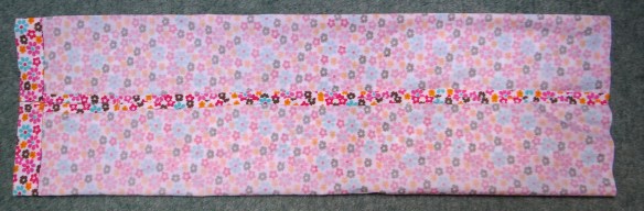 Press open side seams, add draw string chanel