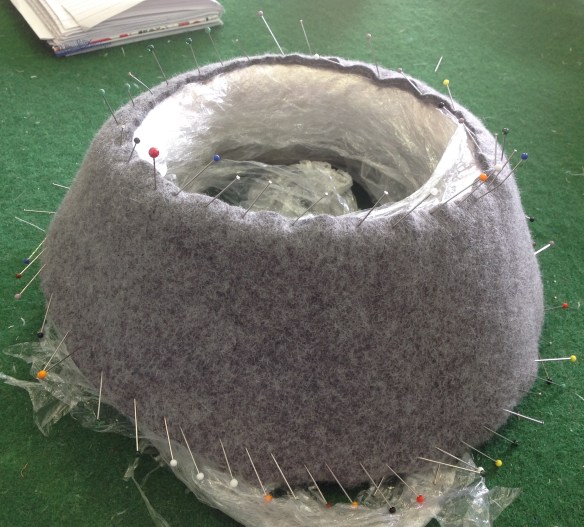 Pin top edge of brim